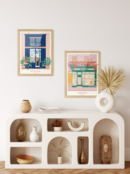 Composition murale avec les affiches "Boutique Fleurie – Printemps en Ville" et "Boutique Littéraire – Automne en Ville", pour une décoration inspirée des saisons en ville