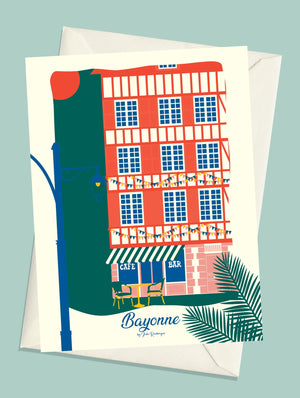 Carte postale illustrée intitulée “Bayonne, La Terrasse” par Julie Roubergue, représentant une terrasse de café bar dans des tons colorés.