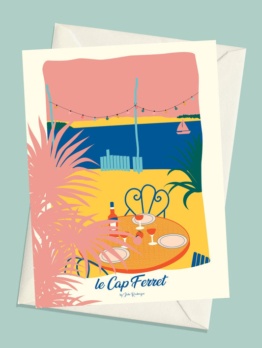 Carte postale illustrée intitulée “Cap Ferret, La Cabane” par Julie Roubergue, représentant la terrasse d'une cabane ostréicole de la presqu'île du Cap Ferret dans des tons colorés.